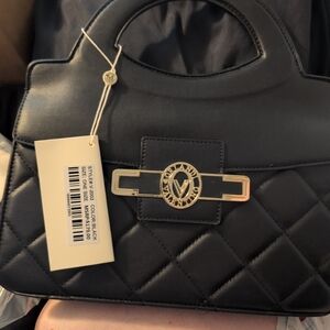Elegant Black Quilted Handbag